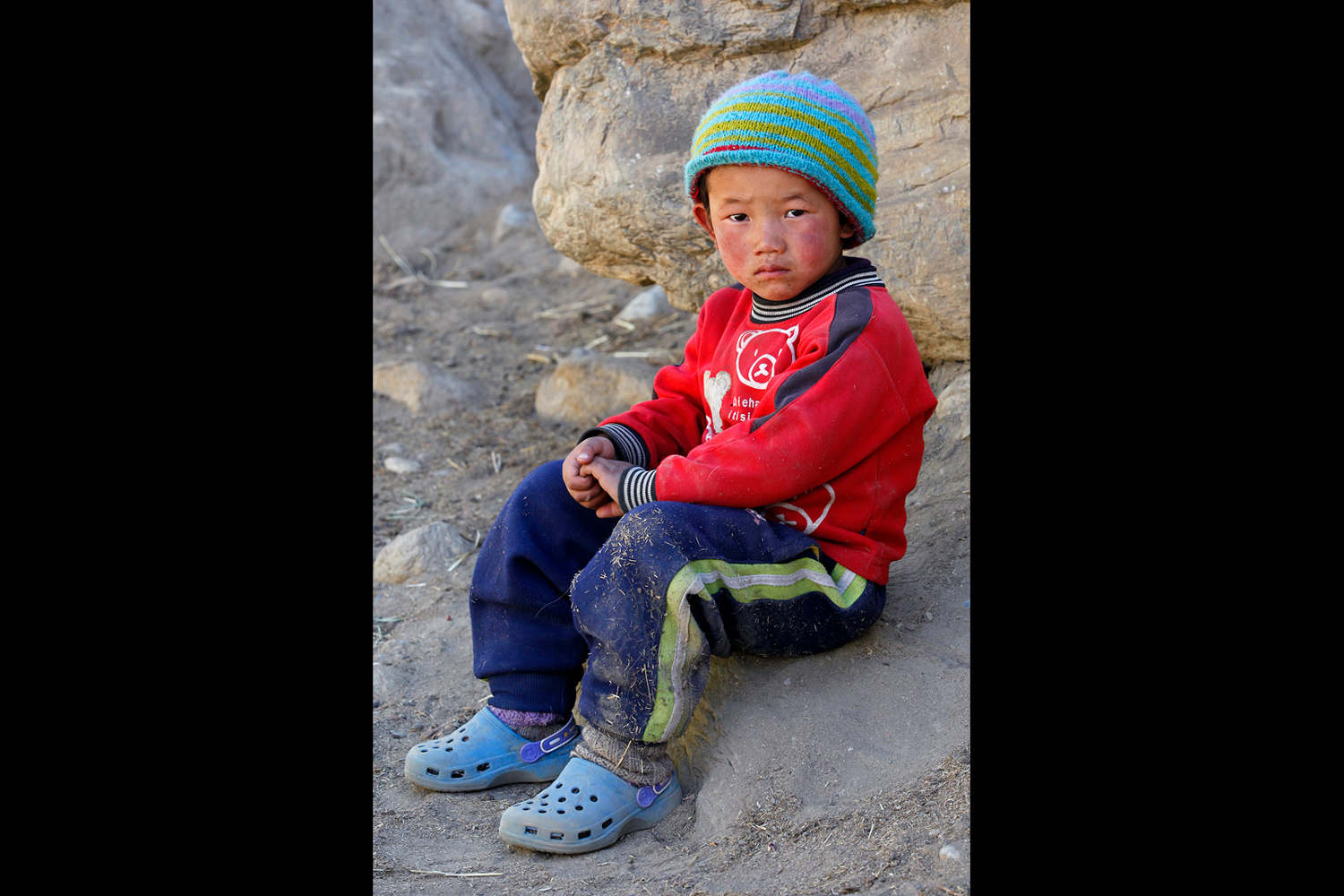 Jeune garçon portant un bonnet dans la région du Mustang au Népal en 2010